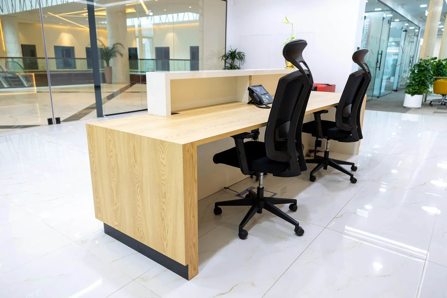 A modern lounge at Austria BC with optimal lighting and simple and ergonomic designs.