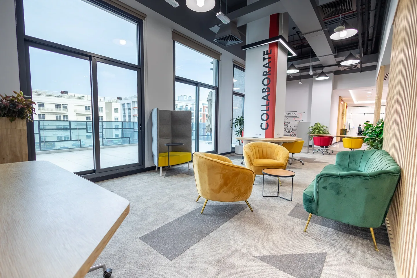 A modern colourful lounge at Austria Business Center, offering flexible workspace solutions including virtual office in Dubai. 